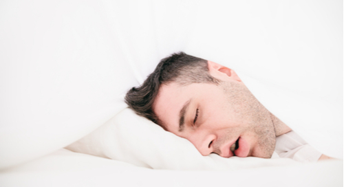 Man sleeping on a pillow