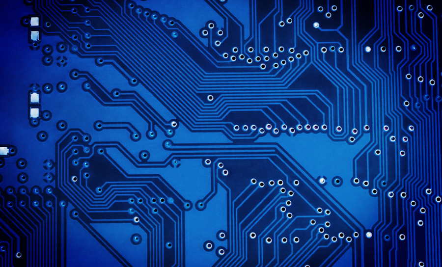  Annular rings as via pads on a blue PCB