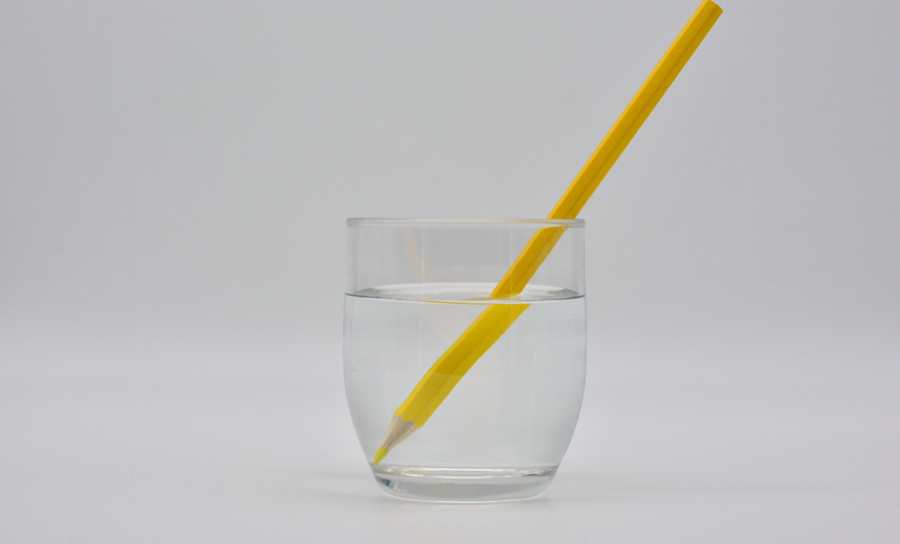 Pencil in a glass of water