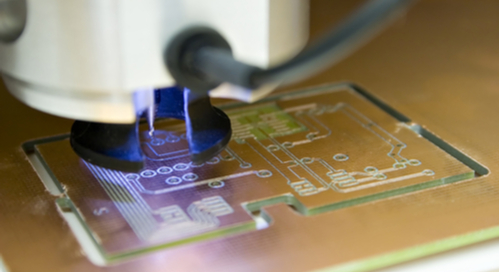 Traces and components on a blue PCB